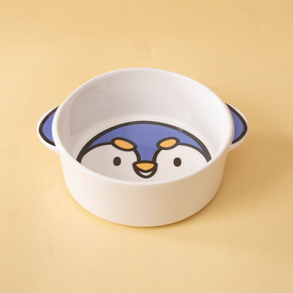 Penguin ceramic pet bowl showing the animal illustration inside the white bowl