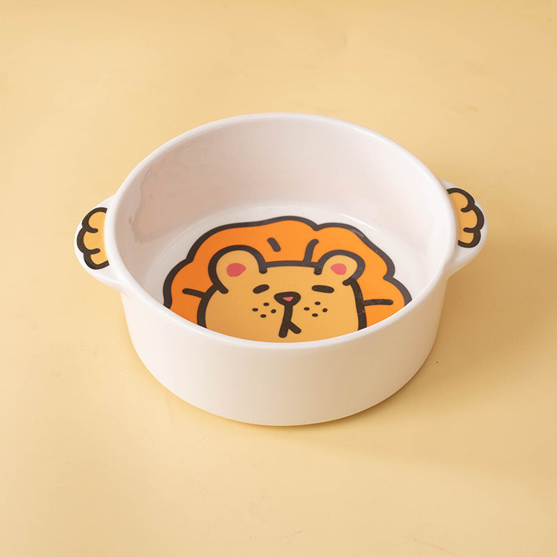 Lion ceramic pet bowl showing the animal illustration inside the white bowl